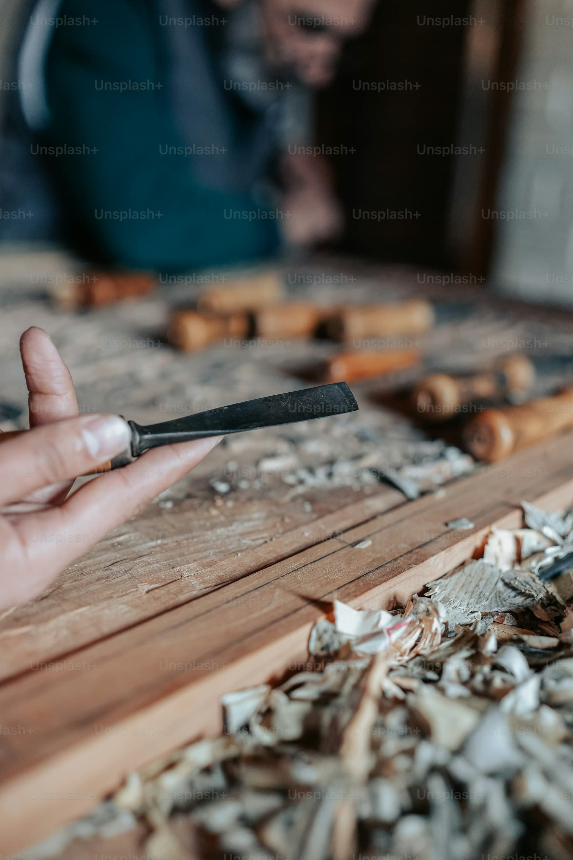 Craftsman hands with precision tools representing meticulous service excellence